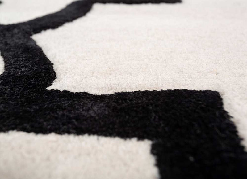 Wollteppich - 270 x 180 cm - schwarz-weiß
